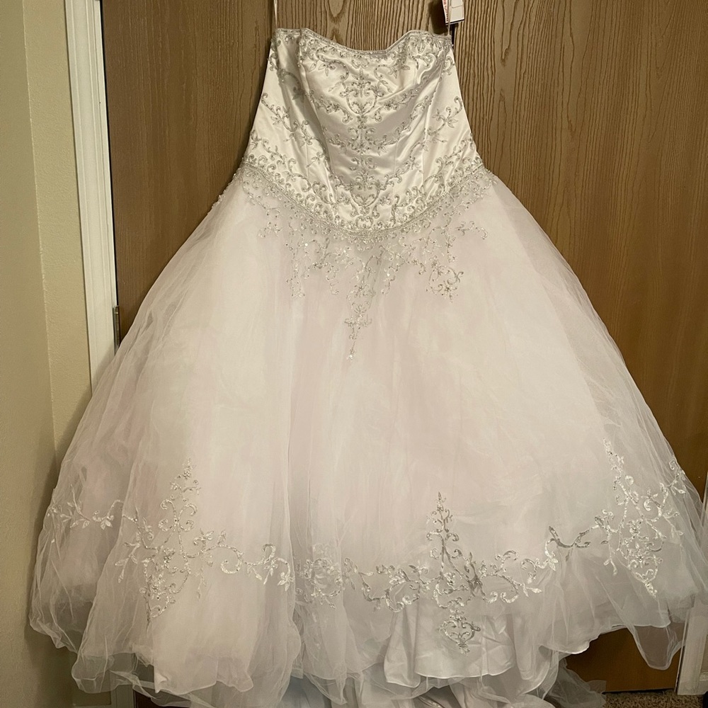 Extra Length Tulle Ball Gown with a Satin Bodice. (Never been worn).